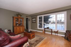 Living Room with picture window - Country homes for sale and luxury real estate including horse farms and property in the Caledon and King City areas near Toronto